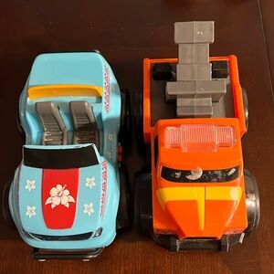 Two toy cars both makes sounds. Has been played with. Works like new.